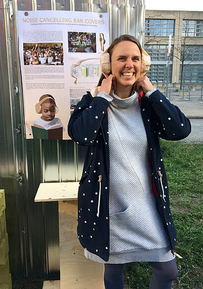 Woman with soundproof headset 