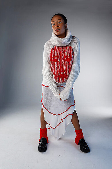 Model in knitted dress