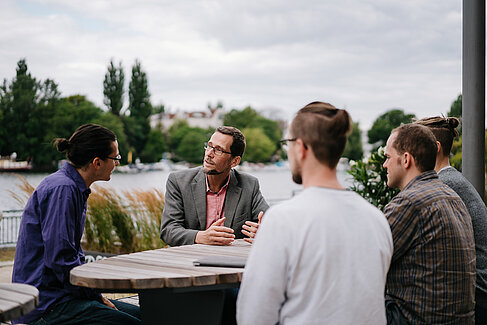 Volker Quaschning talking to collegues