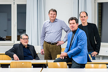 Vier Wissenschaftler